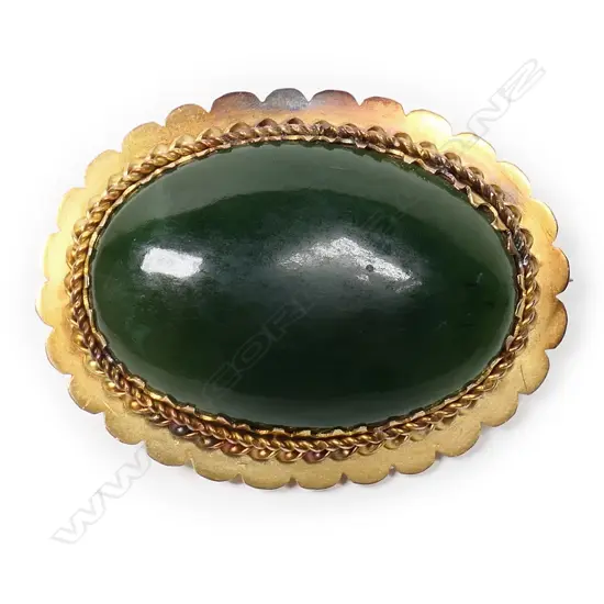 Sandsteins of Christchurch greenstone and 9ct gold brooch,